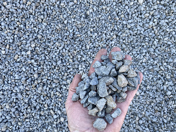 Hand holding gravel